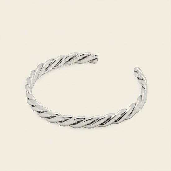 Twisted Strand Cuff with a twisted rope-shaped open band in silver finish