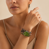 Verdant Path Bracelet worn on the wrist, with layered green and multicoloured bead strands
