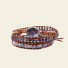 Violet Still Bracelet with purple beads on a layered cord wrap