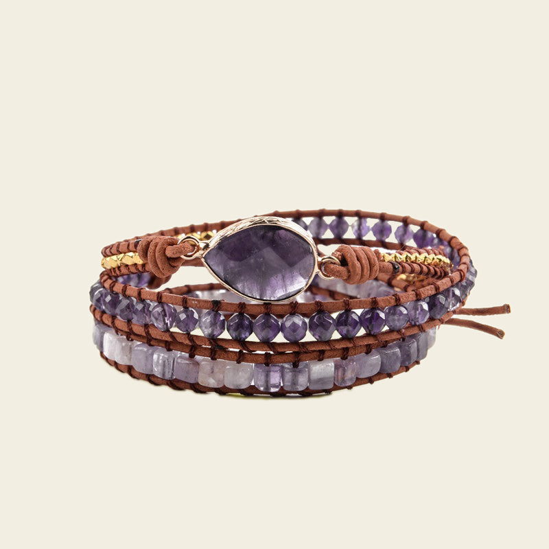 Violet Still Bracelet with purple beads on a layered cord wrap