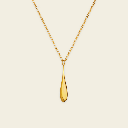 Willow Teardrop Necklace with a fine chain and elongated teardrop pendant in gold finish