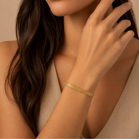 Woven Link Bracelet worn on the wrist in gold finish
