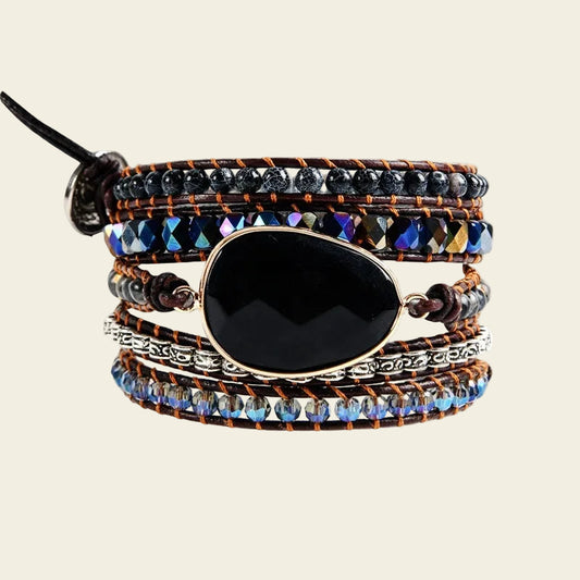 Quiet Anchor Bracelet with dark beads woven onto brown cord
