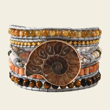 Time Spiral Bracelet with layered earth-toned beads and pale cord