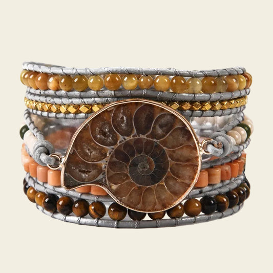 Time Spiral Bracelet with layered earth-toned beads and pale cord